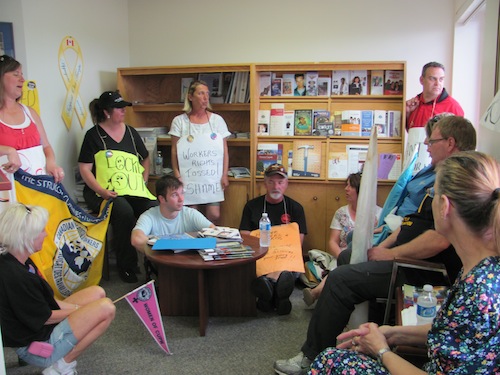 Fredericton postal workers and allies occupy MP's office. Photo: Tracy Glynn. cupwjune21-1