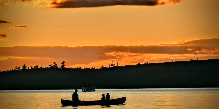 On Miramichi Lake, who holds the paddle?