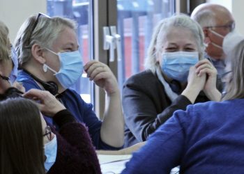 Against backdrop of health care crisis, two events marked by widely divergent approaches