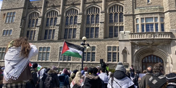 ‘And if we don’t get it – SHUT IT DOWN’: University students rally for a new world